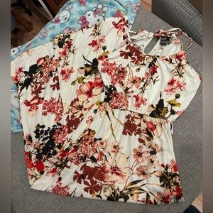 Sun dress with burgundy flowers. Not body con but slim fitting.